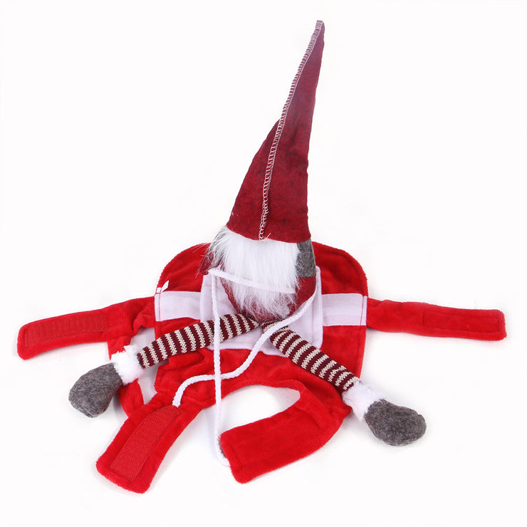 Red and white gnome toy with a long pointed hat on a white background