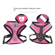 Pink dog harness with reflective material on a white background