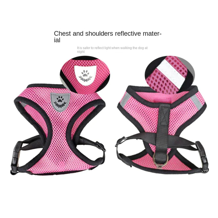 Pink dog harness with reflective material on a white background