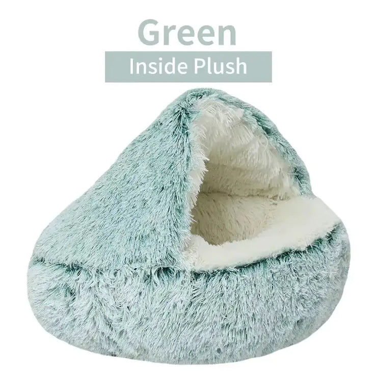 Plush green pet bed with white interior on a white background