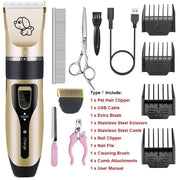Pet grooming kit with hair clipper, scissors, and attachments on a white background