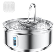 Stainless steel pet water fountain with water flowing into a transparent bowl on a white background.