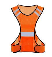 Orange safety vest with reflective stripes on a white background