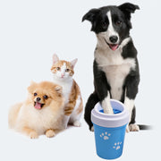 Three pets (two dogs and a cat) with a blue pet water bottle on a white background