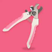 Pet nail clipper with pink handles on a pink background